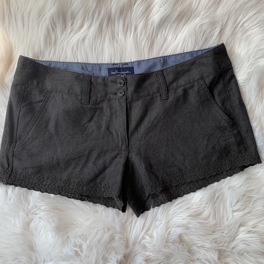 Charcoal gray shorts with embroidered bottoms